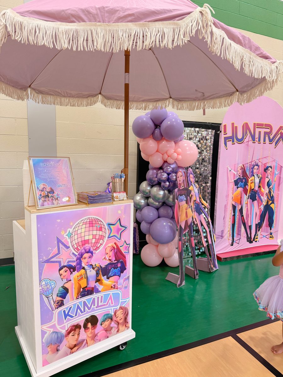 Geli Snacks cart styled for a themed birthday party with balloons