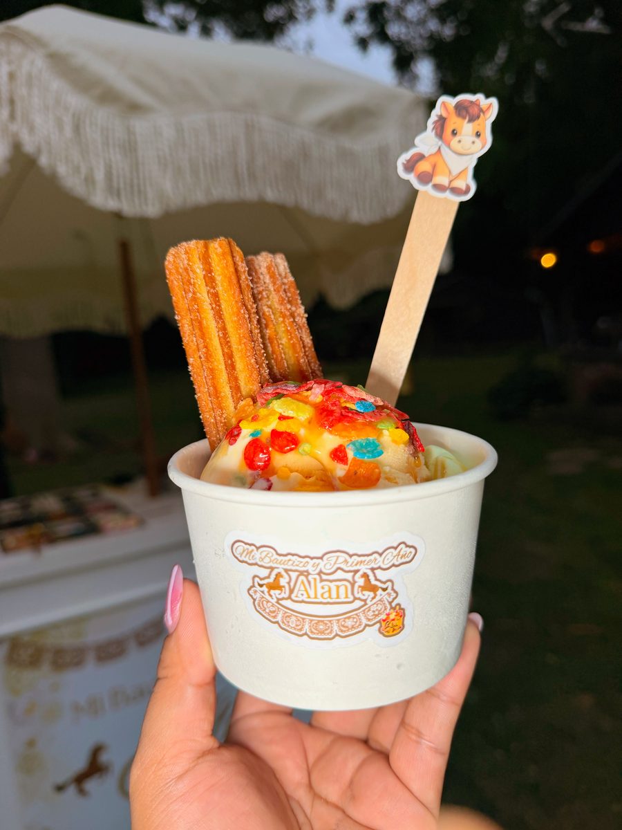 Ice cream cup topped with churro sticks and gummy candy