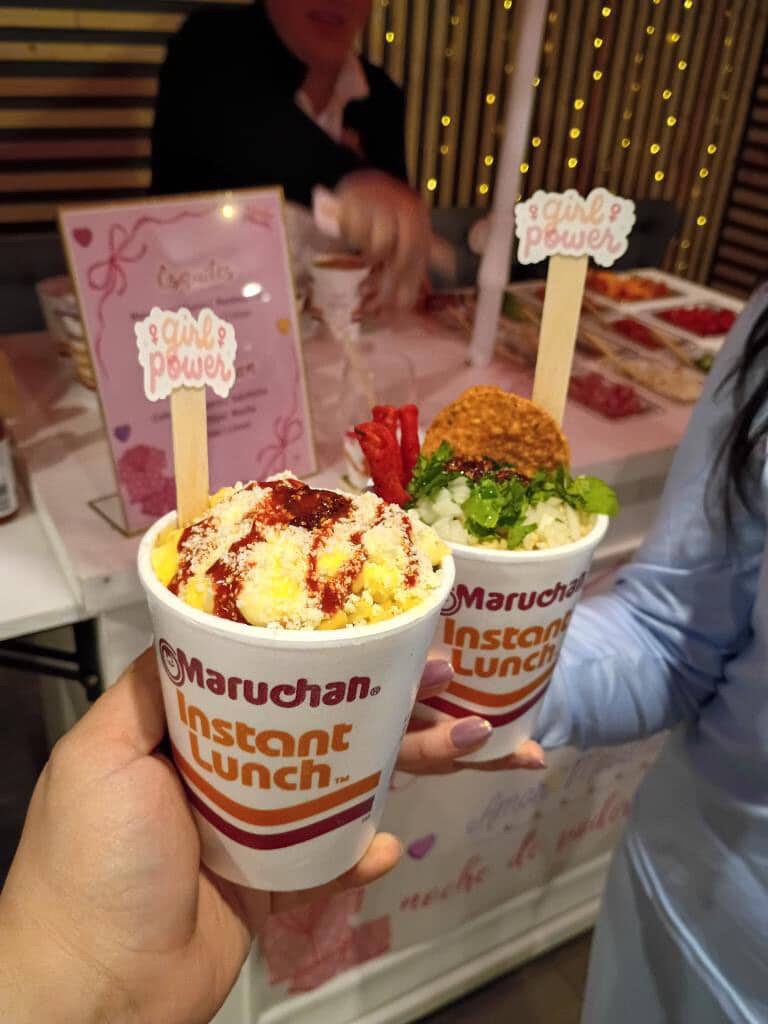 Loaded Maruchan instant noodle cups topped with chamoy and snacks